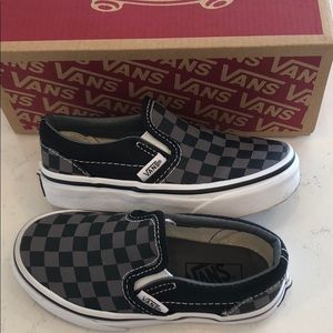 Black and grey boys slip ons